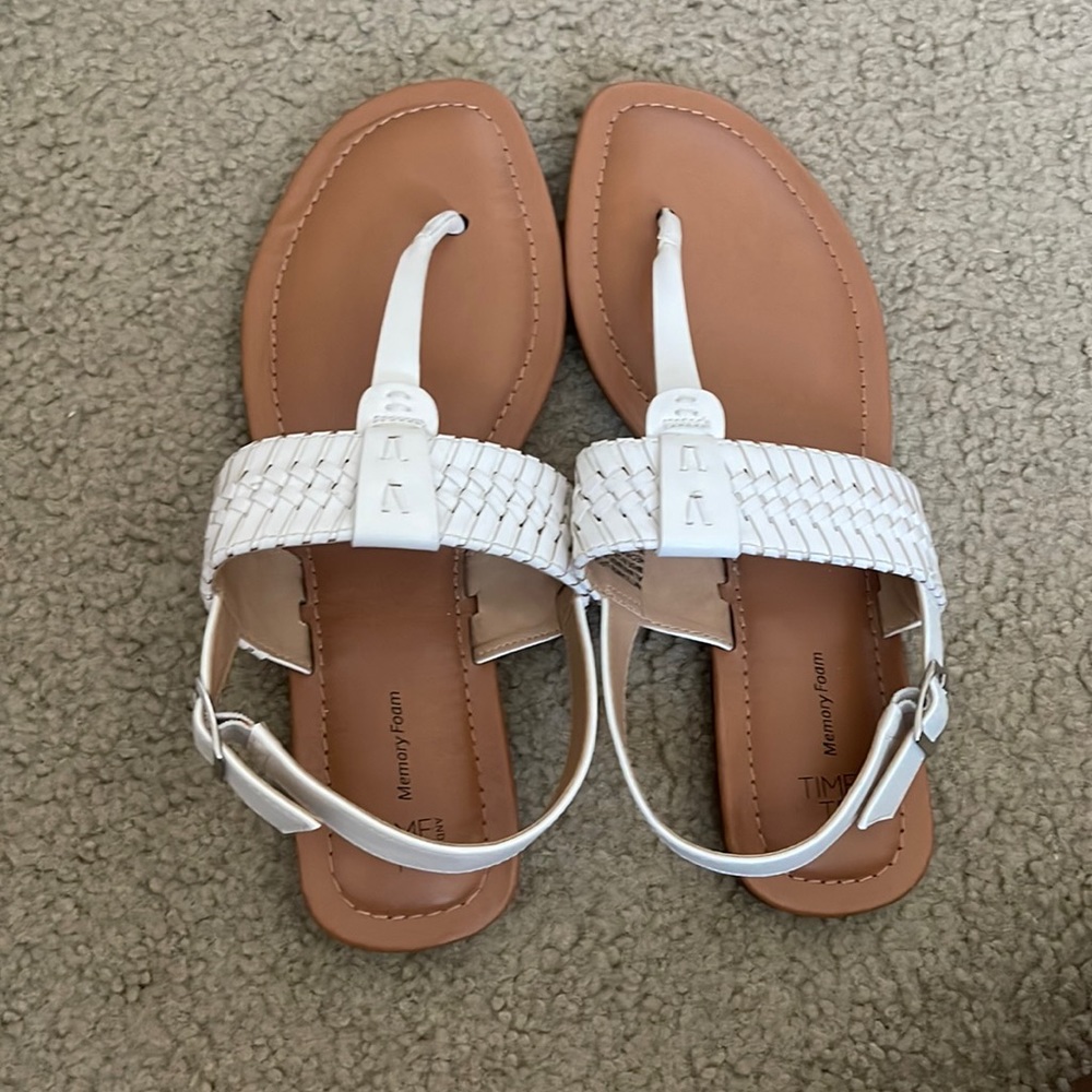 Woman’s white sandals